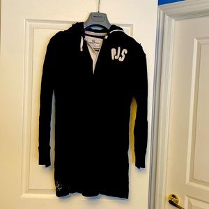 Light sweatshirt dress with hood. I’m 5’5” and it hits about 2” above the knee.